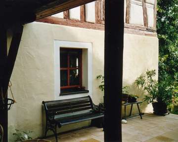 Holiday apartments in Egloffstein: View through the patio gateway